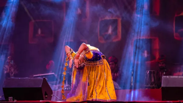 Indian female performing rajasthani folk dance at pushkar fair.